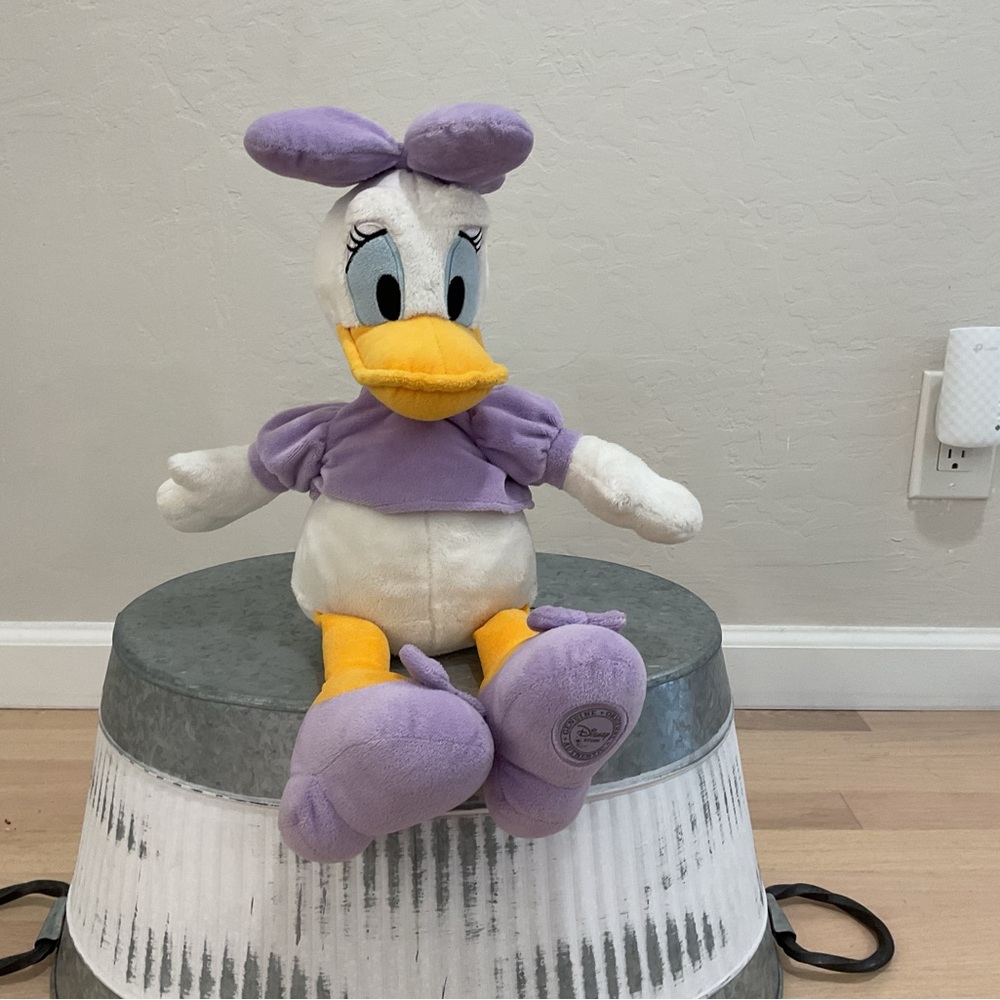 Plush Toy with Purple and White Outfit